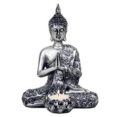 Hõbedane Buddha küünlaalusega