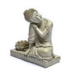 Puhkav Buddha küünlaalusega
